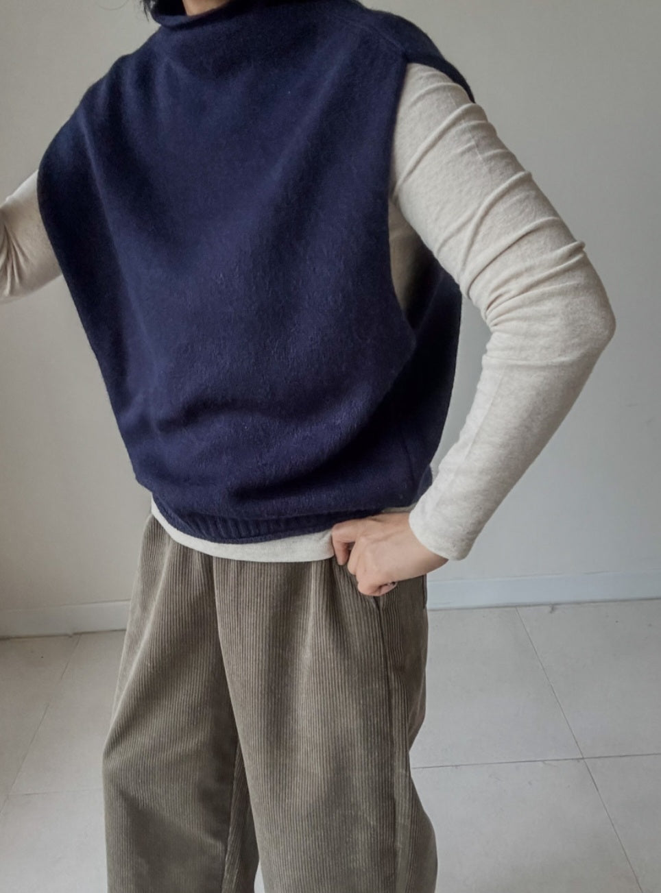 (NEW) 돌돌이 반폴라 니트조끼